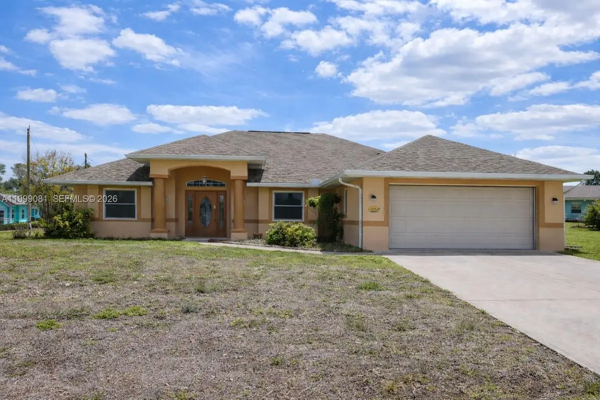 825 Costa Pl, Lehigh Acres, FL 33972 - #1