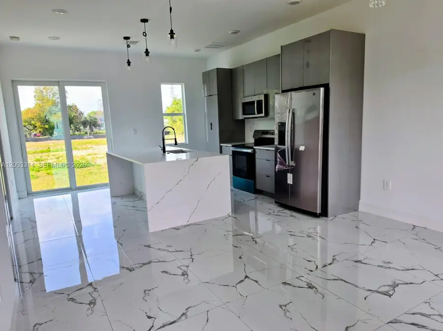 402 Harrison Dr, Lehigh Acres, FL 33936 - #2