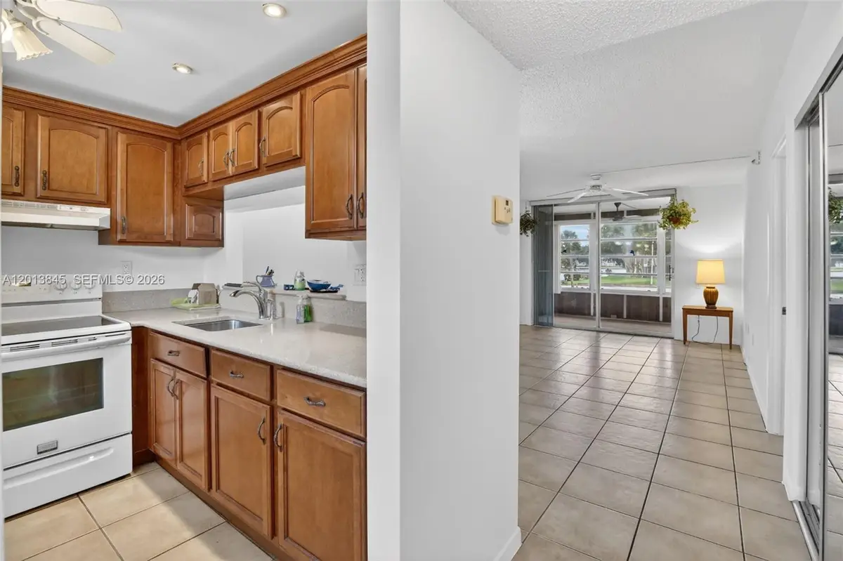 9090 Lime Bay Blvd #203, Tamarac, FL 33321 - #1