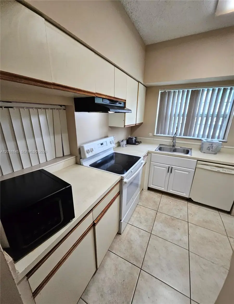 631 Cypress Lake Blvd #E17, Deerfield Beach, FL 33064 - #2