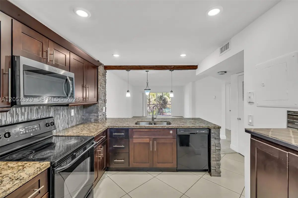 1100 NW 87th Ave #307, Coral Springs, FL 33071 - #1