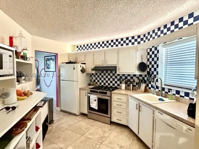 6555 W Broward Blvd #306, Plantation, FL 33317 - #1