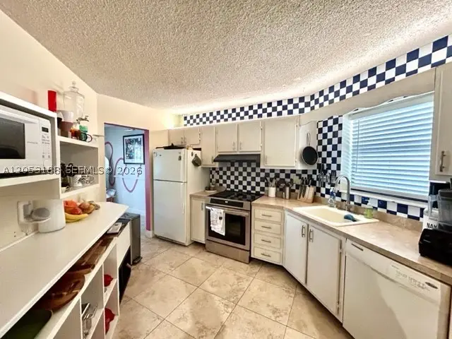 6555 W Broward Blvd #306, Plantation, FL 33317 - #2