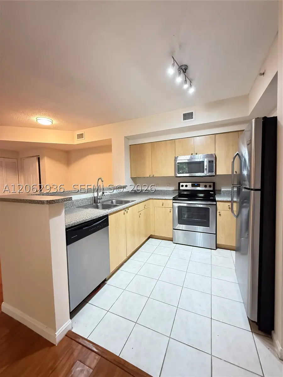 7940 N Nob Hill Rd #204, Tamarac, FL 33321 - #2