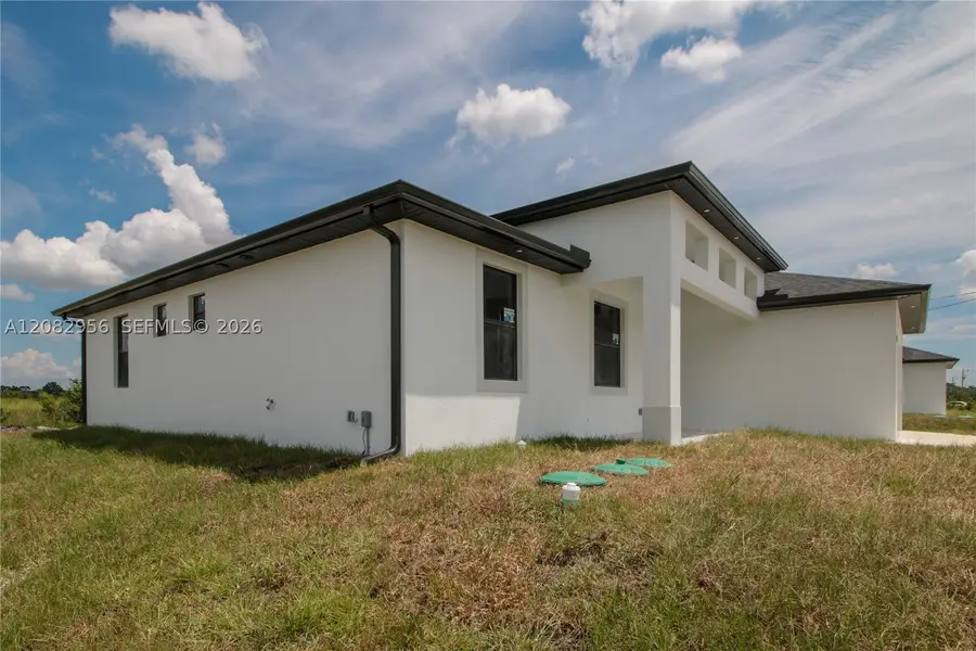 943 Commodore St, Lehigh Acres, FL 33974 - #3