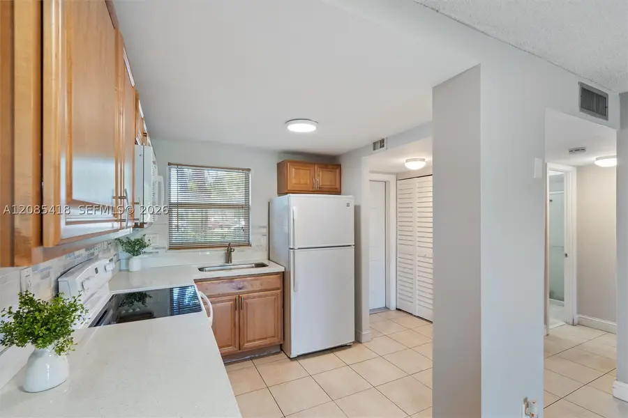 9761 Sunrise Lakes Blvd #107, Sunrise, FL 33322 - #3
