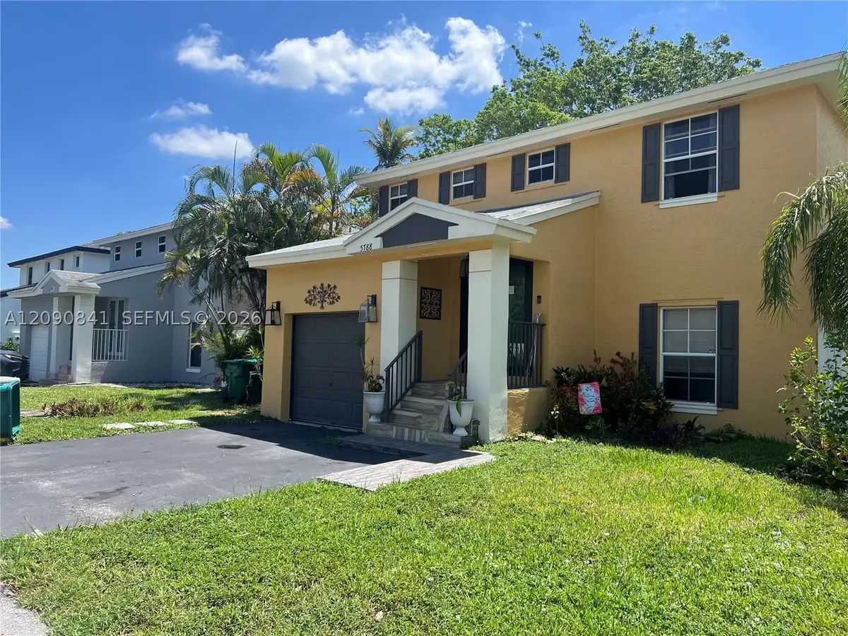 5788 Woodland Point Dr, Tamarac, FL 33319 - #1