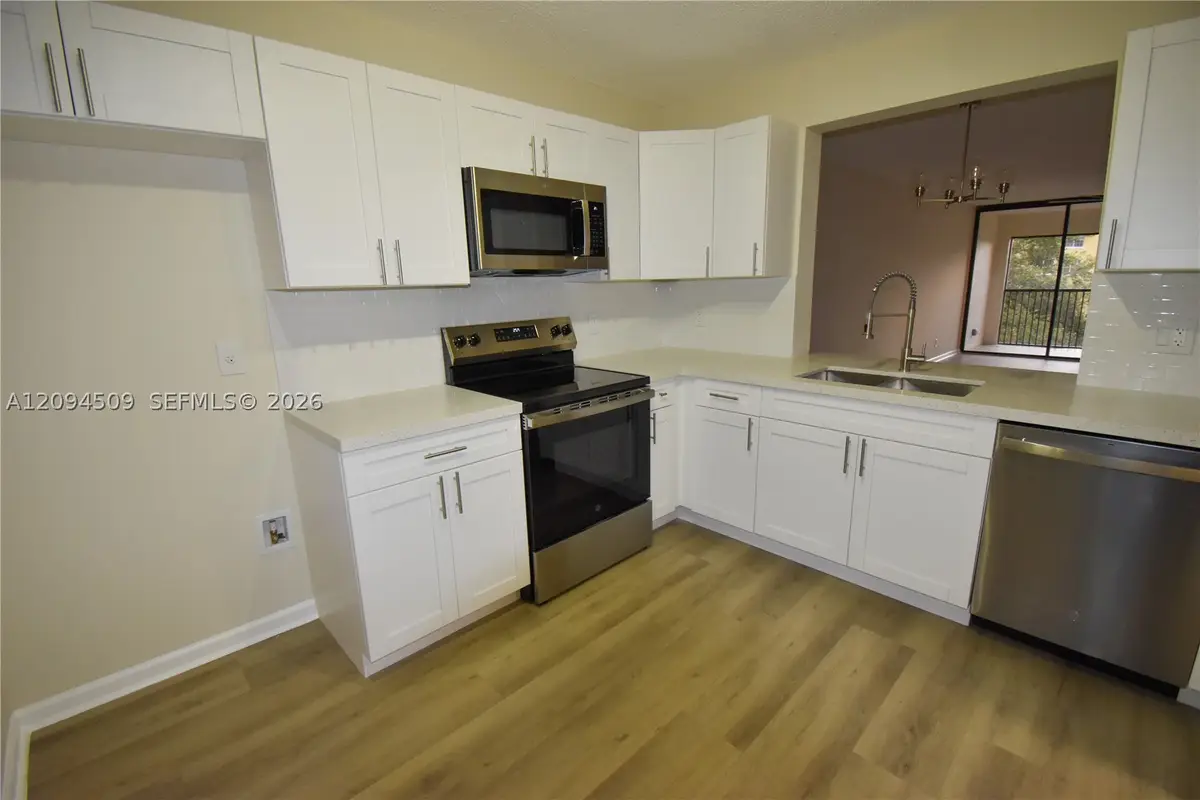 8592 W Sunrise Blvd #303, Plantation, FL 33322 - #1