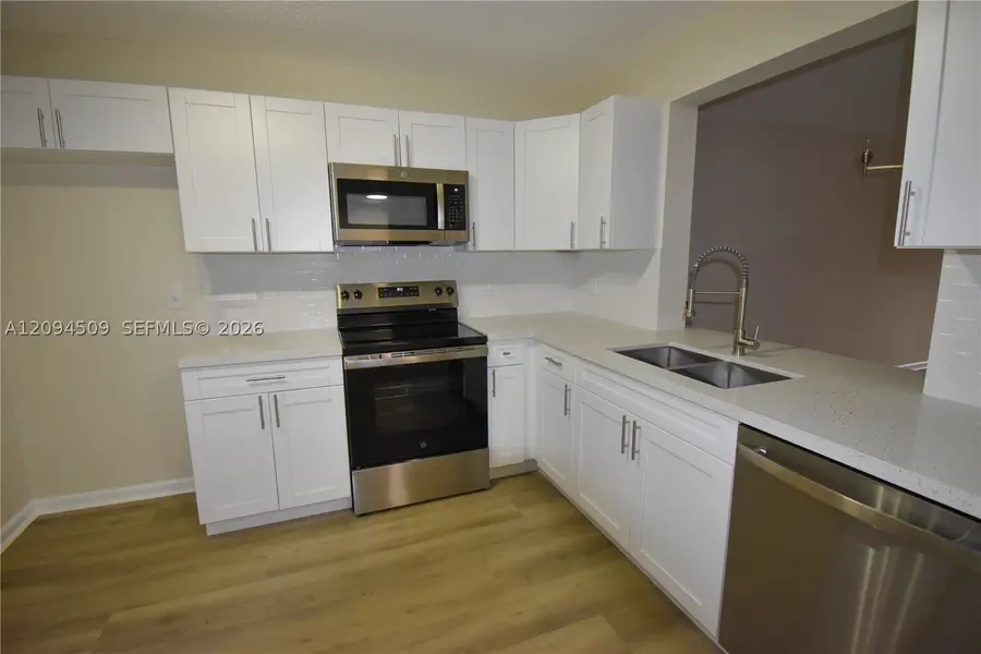 8592 W Sunrise Blvd #303, Plantation, FL 33322 - #2